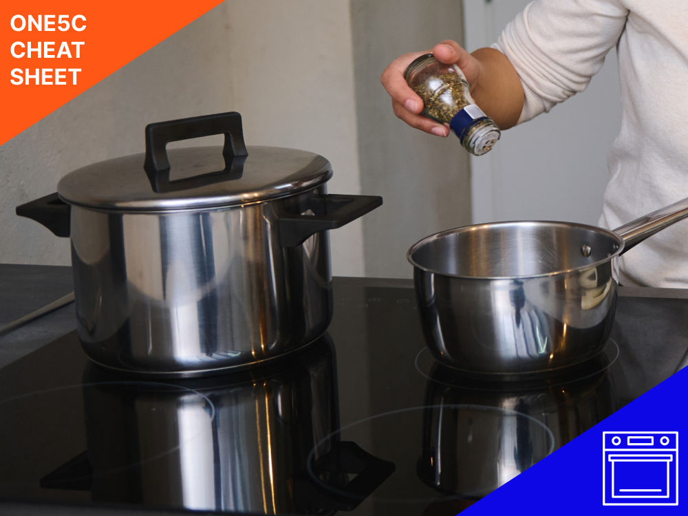 person-adding-spices-to-a-pot