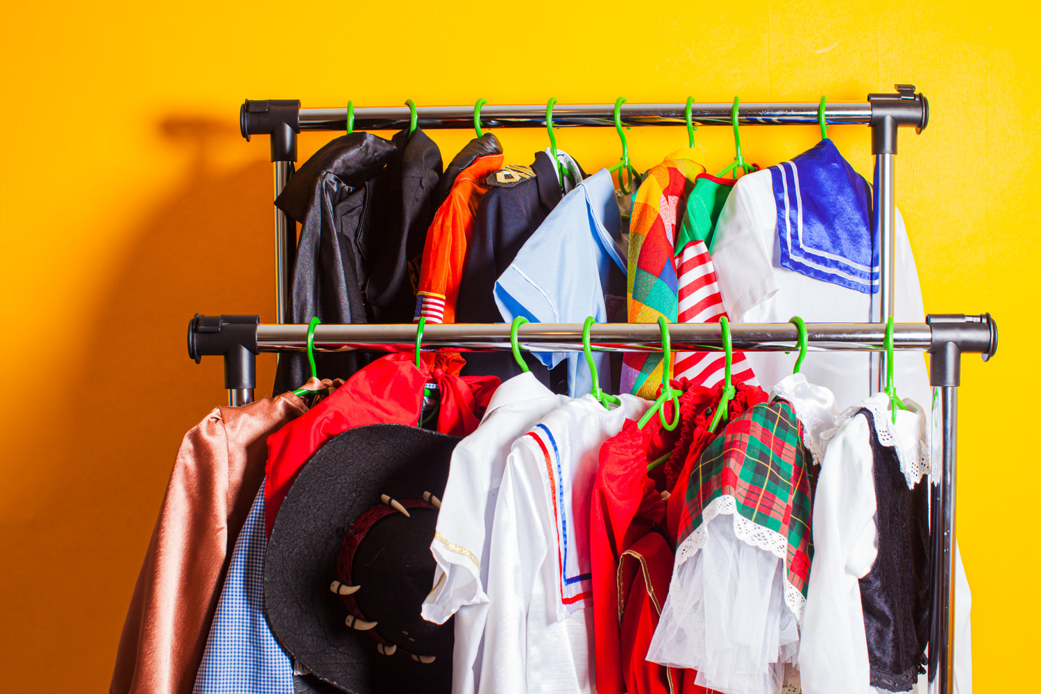 costumes on clothing racks