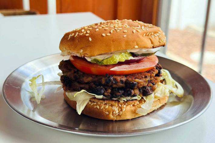 black bean smash burger on bun on plate