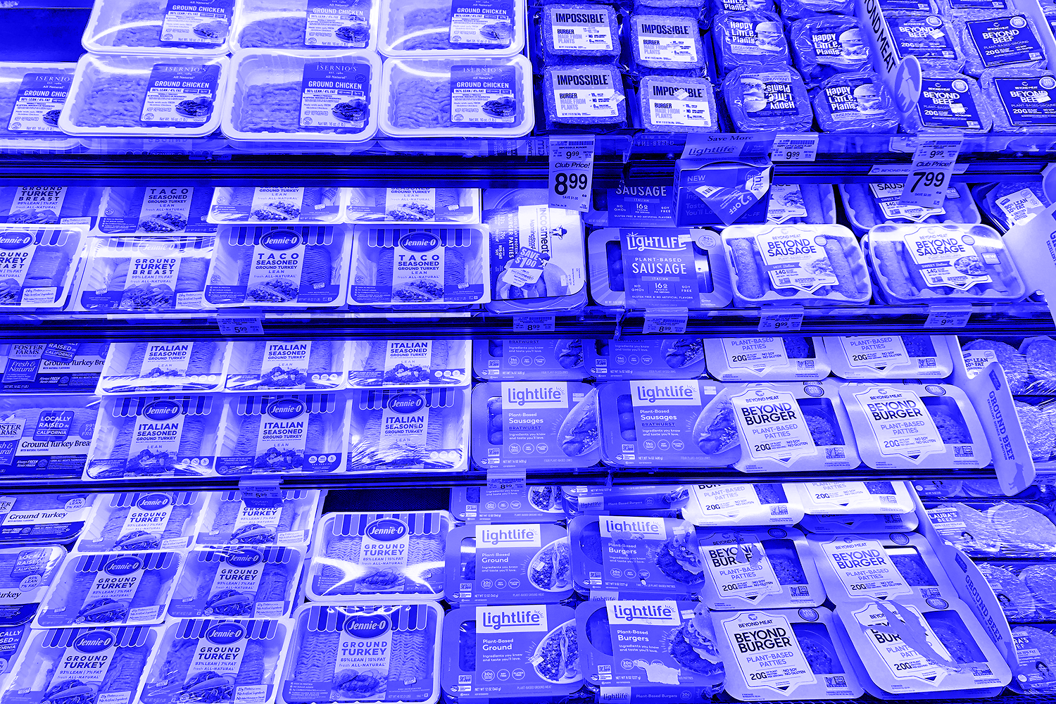 meat case at grocery store with plant-based options