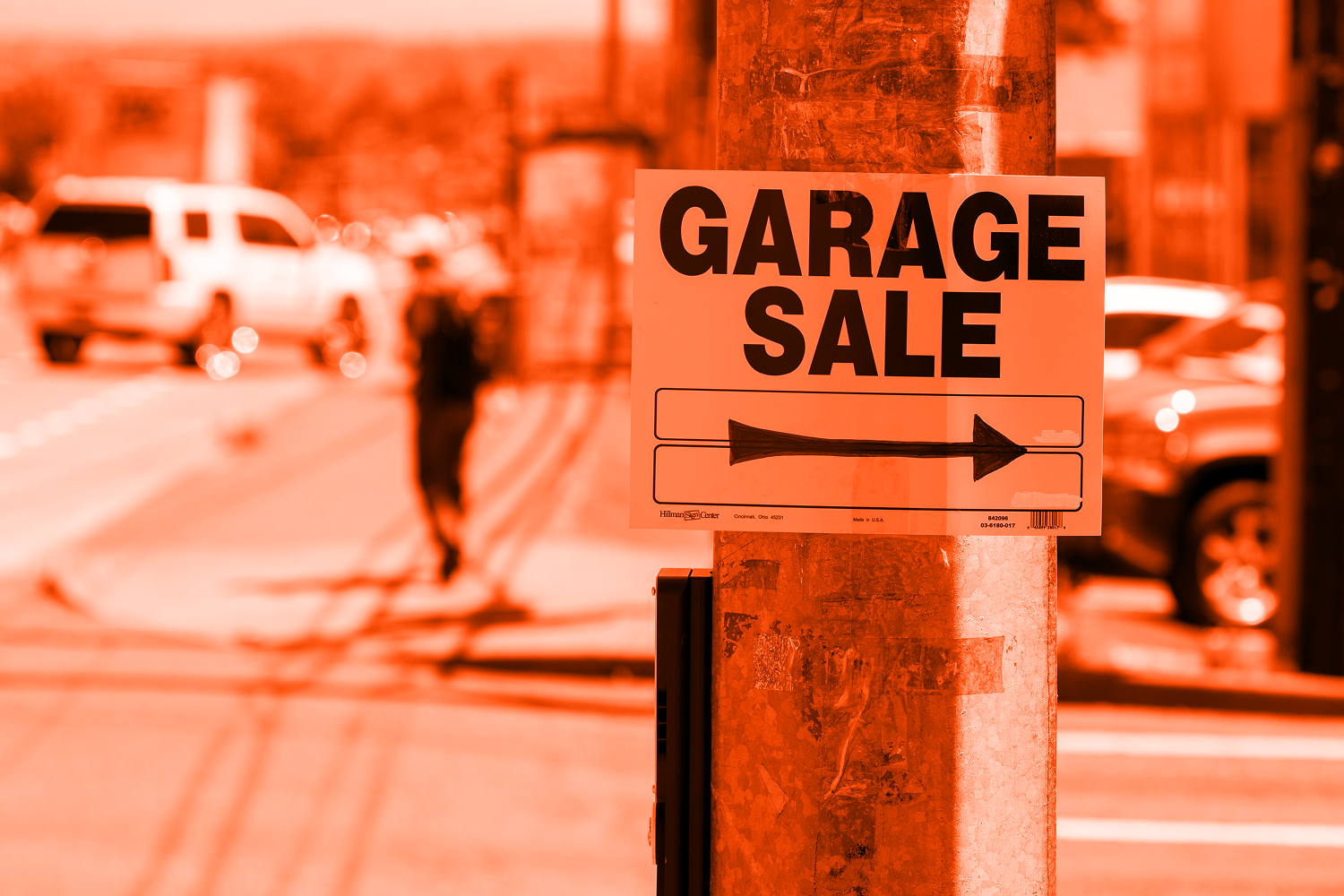 Closeup of a garage sale sign on the street