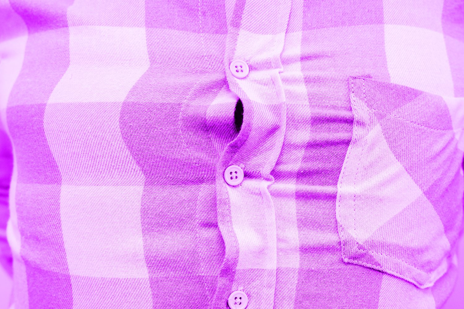 Close-up of a man in a shirt too small