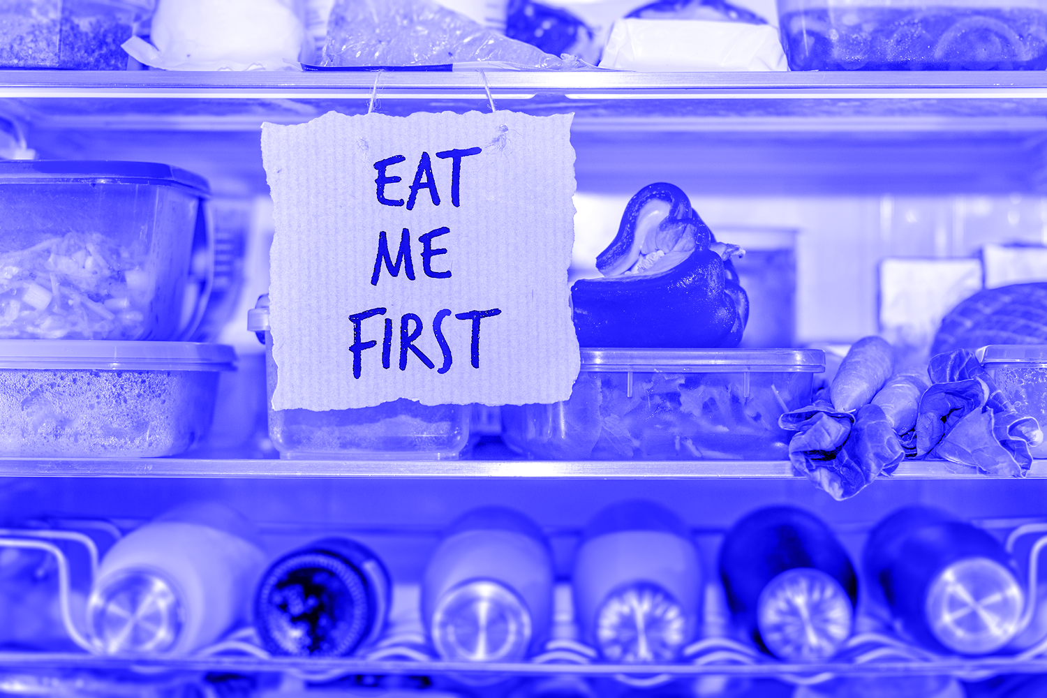 Eat Me First handmade sign in fridge