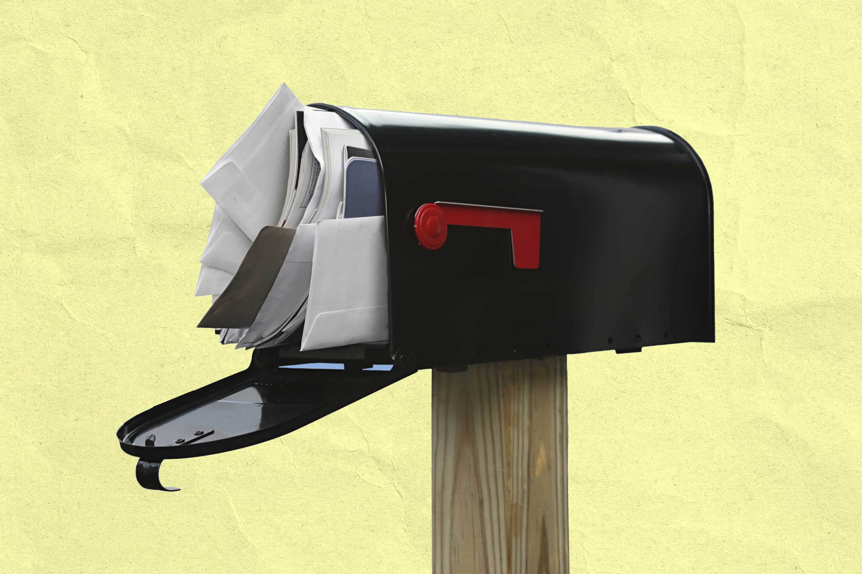 junk mail crammed in mailbox