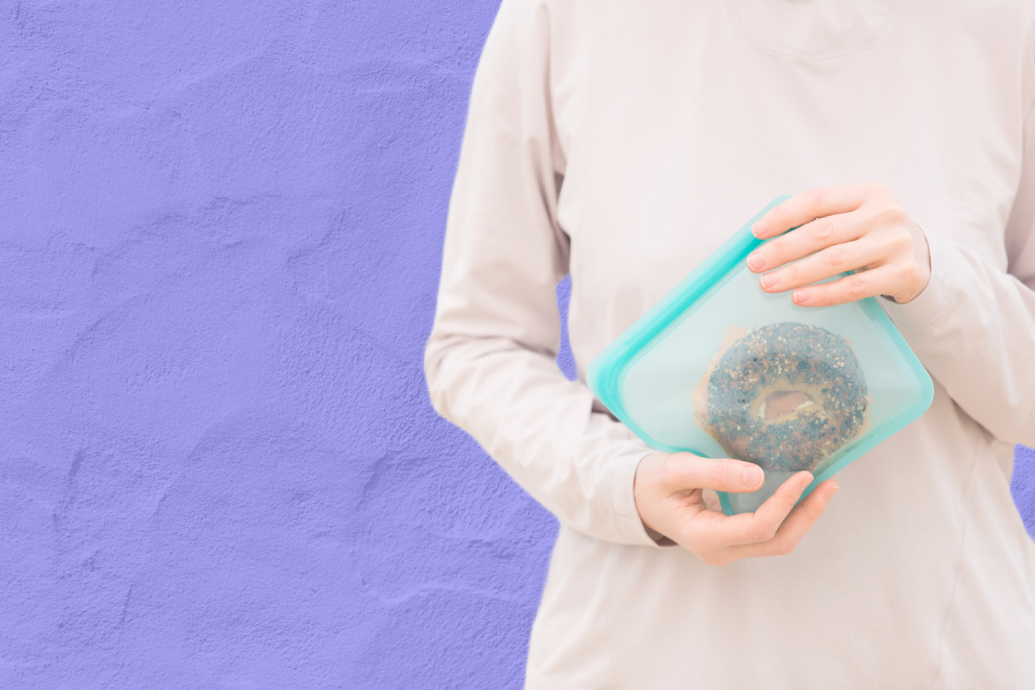 woman holding silicone food storage bag