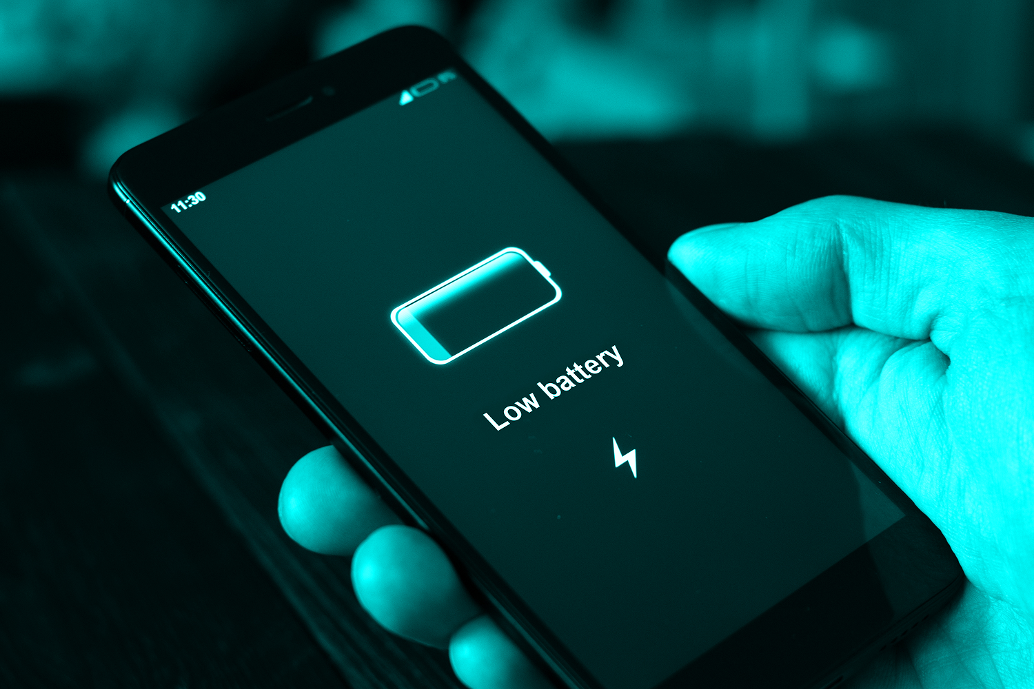 phone with low battery indicator on screen